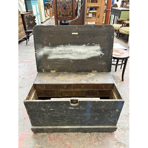 48 - A Victorian painted pine tool box with fitted interior