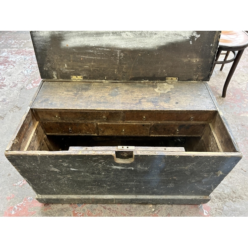 48 - A Victorian painted pine tool box with fitted interior