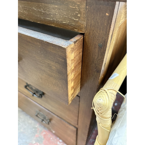 58 - An Edwardian oak chest of three drawers