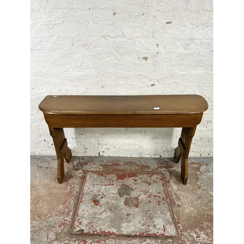 62 - An early/mid 20th century pine organ bench - approx. 71cm high x 130cm wide x 30cm deep