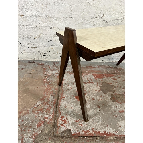 63 - A mid 20th century oak and formica rectangular coffee table