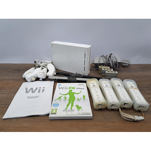 682 - A boxed Nintendo Wii console with games and accessories