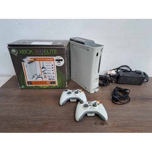 683 - Two Xbox 360 consoles, one boxed and one unboxed with Kinect games and accessories