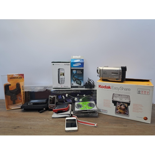 684 - A box containing various technology to include one boxed Kodak Easyshare unit, one Apple iPhone A138... 