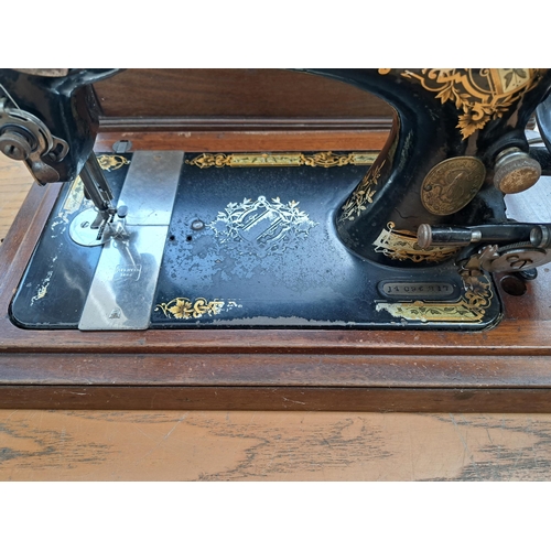 688 - A vintage Singer sewing machine