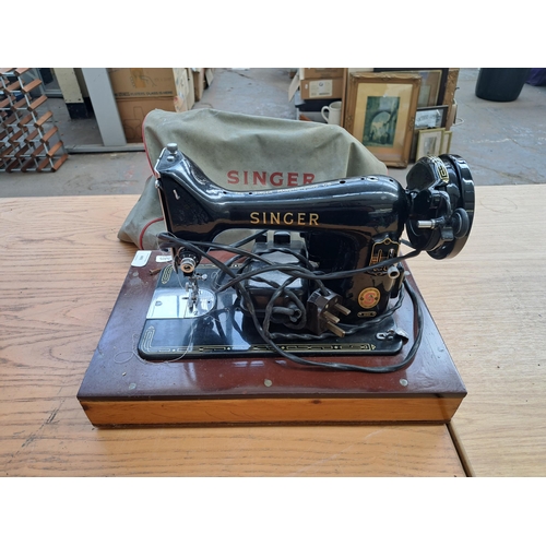 691 - A vintage Singer sewing machine