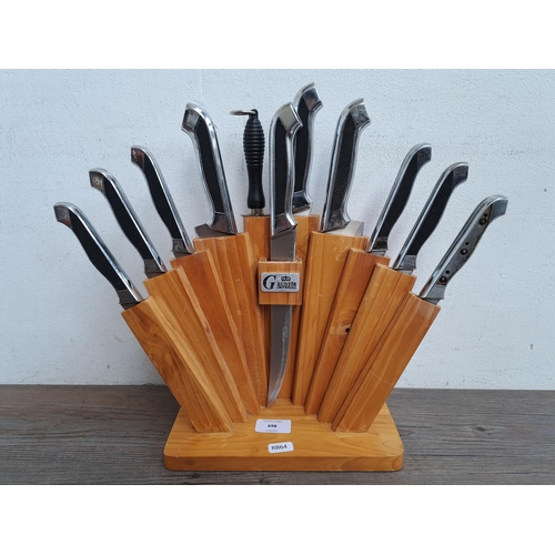 698 - A set of Runtik Imperial kitchen knives and sharpener