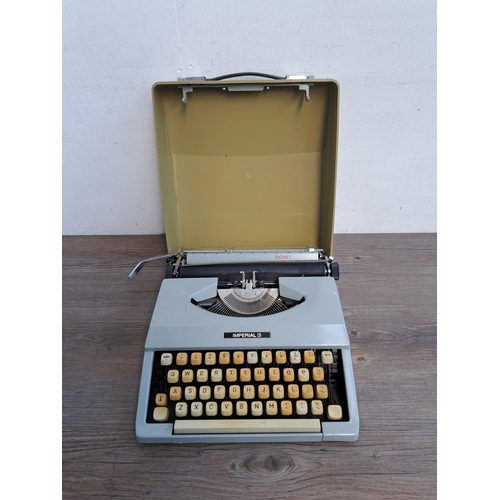 701 - An Imperial Signet portable typewriter