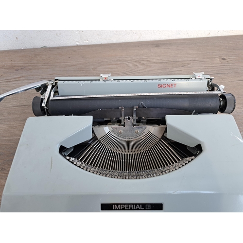 701 - An Imperial Signet portable typewriter