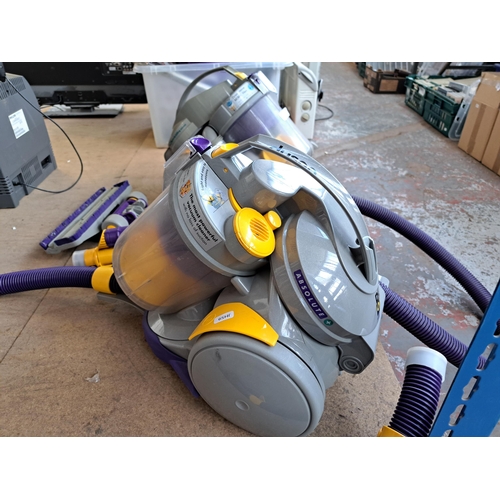 707 - Two Dyson DC05 vacuum cleaners