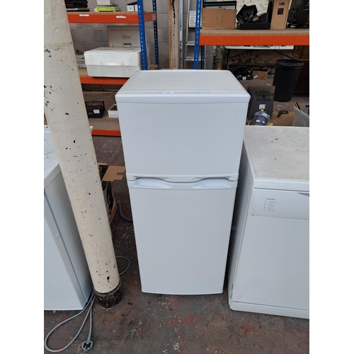 709 - An unbranded freestanding fridge freezer - approx. 114cm high x 47cm wide x 49cm deep