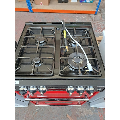 711 - A Belling four ring stove cooker and grill unit - approx. 94cm high x 60cm wide x 64cm deep