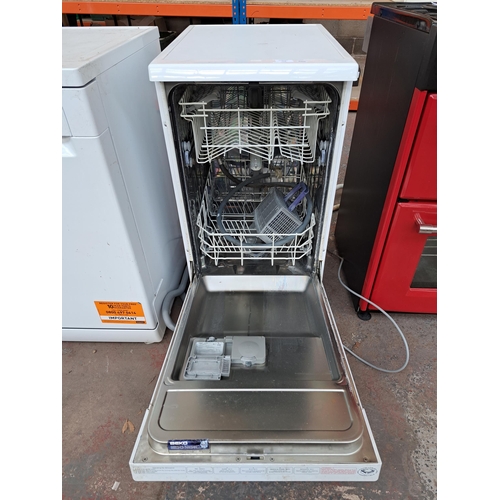 712 - A Beko model no. DE2542FW undercounter dishwasher - approx. 86cm high x 45cm wide x 60cm deep