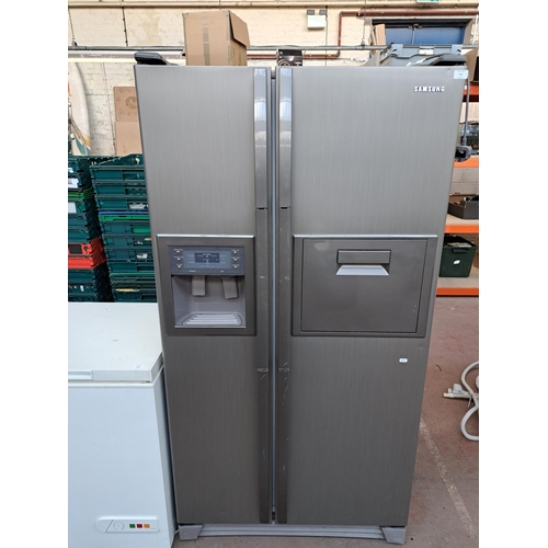 715 - A Samsung twin door freestanding fridge freezer with water/ice dispenser and fridge hatch - approx. ... 