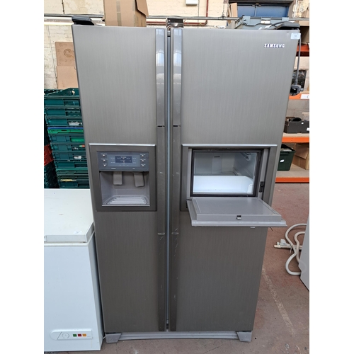 715 - A Samsung twin door freestanding fridge freezer with water/ice dispenser and fridge hatch - approx. ... 