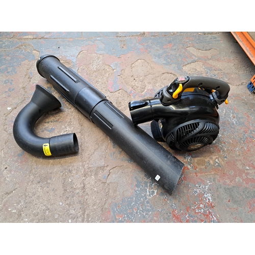 774 - A McCulloch MACJBV345 petrol leaf blower with attachments