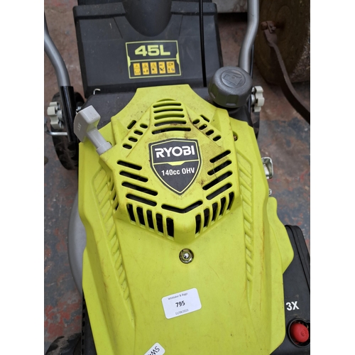 795 - A Ryobi RLM4114 petrol lawn mower with grass collector