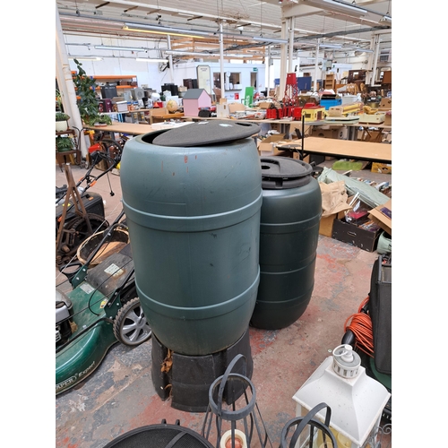 798 - Two plastic water barrels