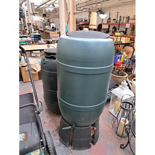 798 - Two plastic water barrels