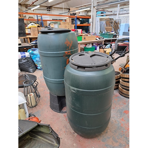 798 - Two plastic water barrels