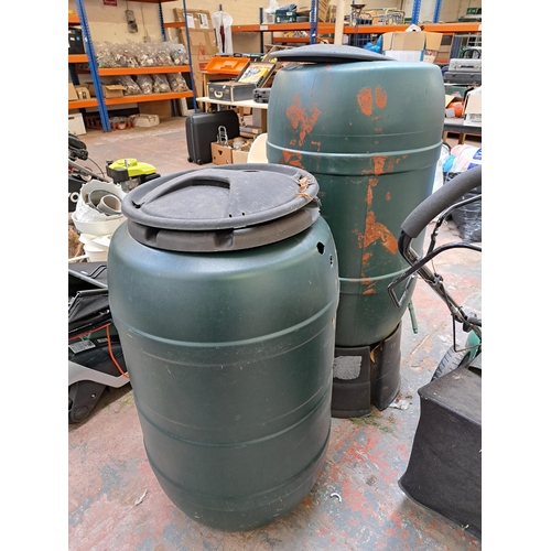 798 - Two plastic water barrels