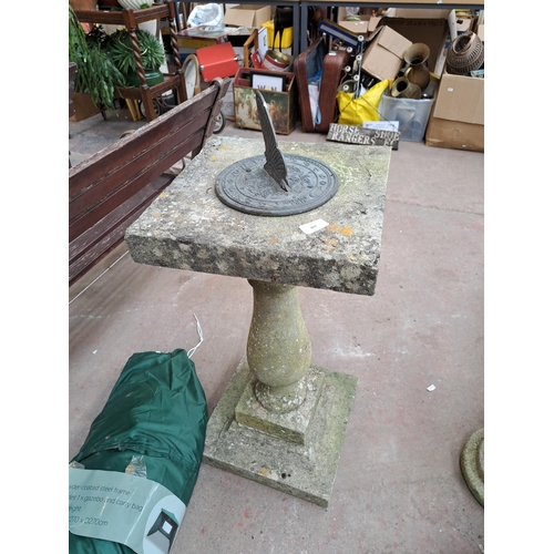 807 - A cast stone and metal pedestal sun dial - approx. 85cm high