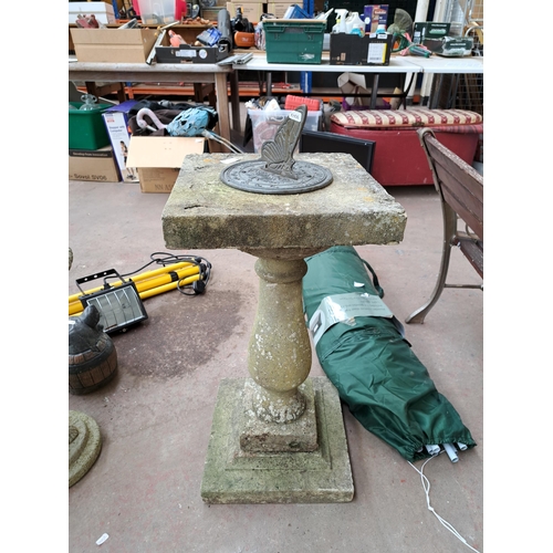 807 - A cast stone and metal pedestal sun dial - approx. 85cm high