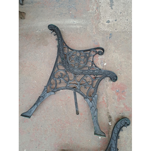 808 - A pair of 19th century style cast iron garden bench ends