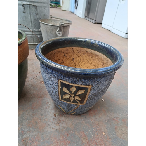 814 - Three glazed terracotta planters, two Heritage Garden Pottery and one other