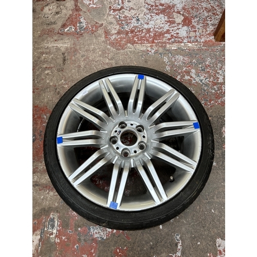 52 - A BMW M Series alloy wheel with later added smoked glass top