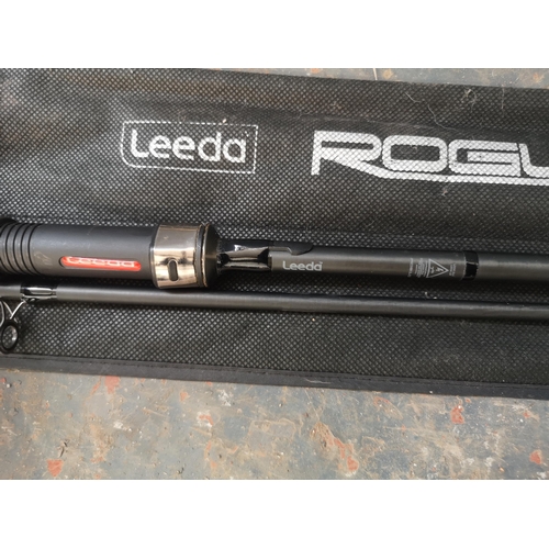 725 - A bagged Leeda Rogue 11ft 1.75lb test curve two piece Barbel rod