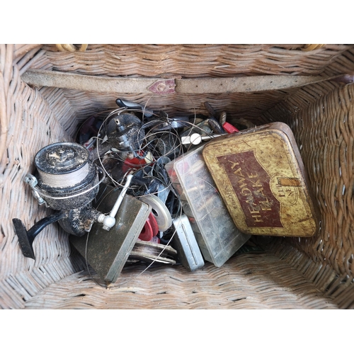 738 - Two fishing tackle boxes containing vintage Mitchell and Daiwa reels, lures etc. Together with a box... 