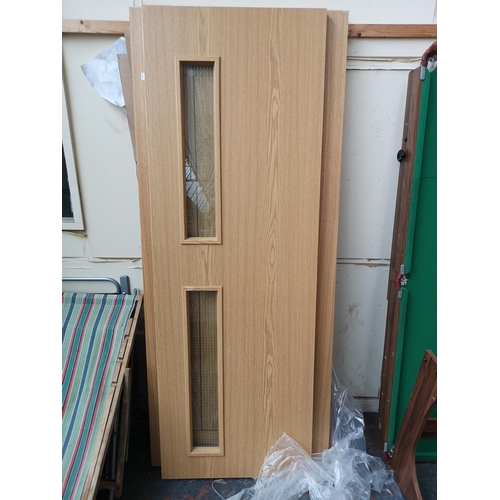 750 - Four fire doors to include Howdens four panel glazed oak etc.