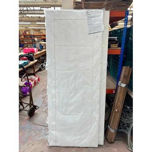 755 - Three sealed as new Howdens FD30 internal engineered primed doors