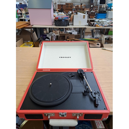 825 - A large collection of house clearance items to include Crosley record player, mid 20th century child... 