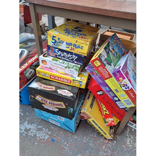 826 - A large collection of boxed toys and games to include Warner Bros The Looney Tunes Tweetie and Sylve... 