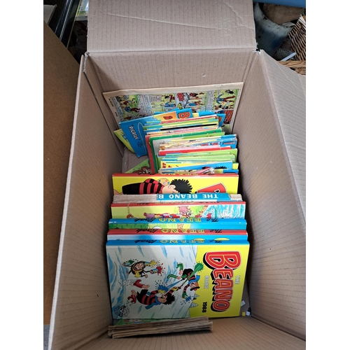 844 - Three boxes containing vintage The Beano annuals, boxed Marie's watercolour paints, jewellery making... 