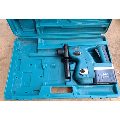 777 - Two cased hammer drills, one Makita cordless and one Performance 240v