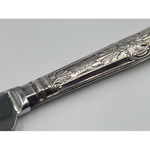 2302A - A cased set of six stainless steel butter knives with hallmarked sterling silver handles