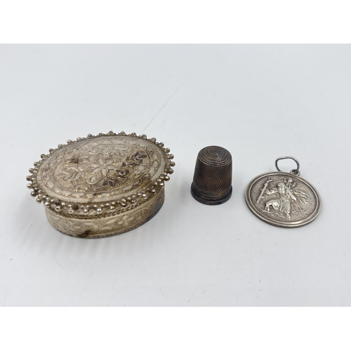 2306 - Three pieces of silver, one .800 pill box, one hallmarked sterling thimble and one hallmarked Birmin... 