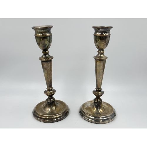 2312 - A pair of A T Cannon Ltd hallmarked Birmingham silver weighted candlesticks, dated 1973 - approx. gr... 