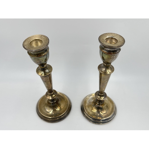 2312 - A pair of A T Cannon Ltd hallmarked Birmingham silver weighted candlesticks, dated 1973 - approx. gr... 