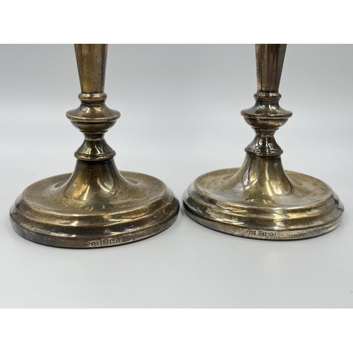 2312 - A pair of A T Cannon Ltd hallmarked Birmingham silver weighted candlesticks, dated 1973 - approx. gr... 