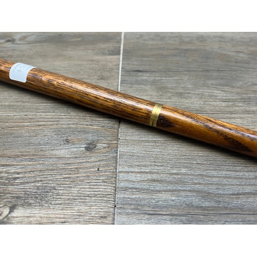 433B - A mid 20th century oak and brass novelty duck walking stick