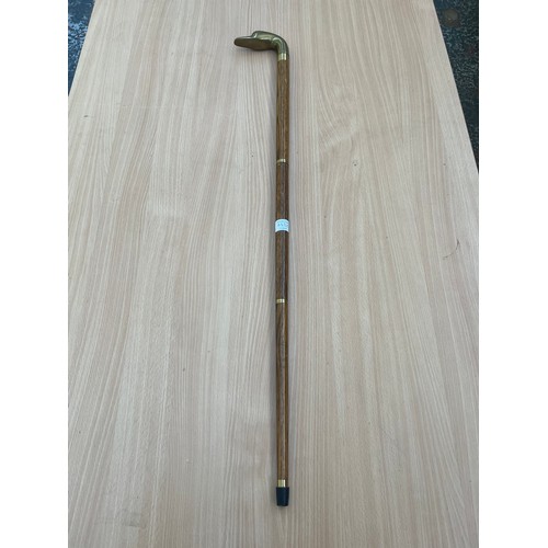 433B - A mid 20th century oak and brass novelty duck walking stick