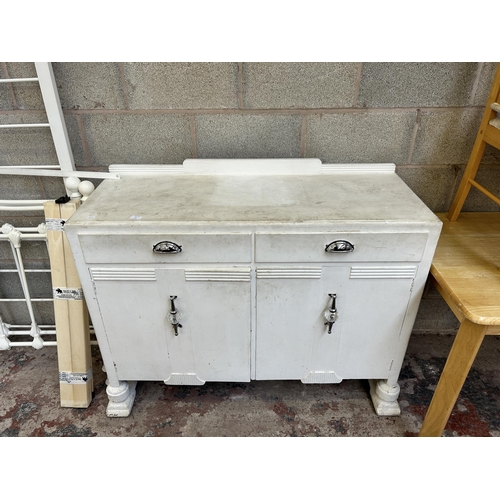 30 - An Art Deco white painted sideboard