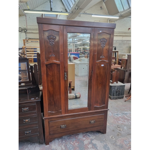 86 - An Edwardian walnut mirror door wardrobe - approx. 199cm high x 116cm wide x 46cm deep