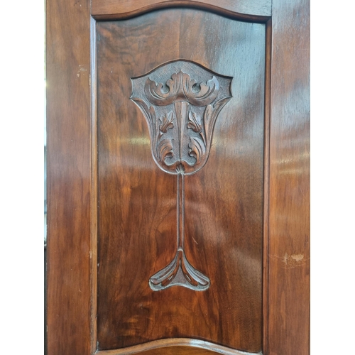 86 - An Edwardian walnut mirror door wardrobe - approx. 199cm high x 116cm wide x 46cm deep