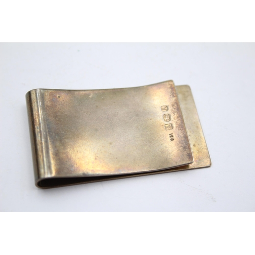 2261 - A William Manton hallmarked Birmingham silver money clip, dated 1982 - approx. gross weight 21g