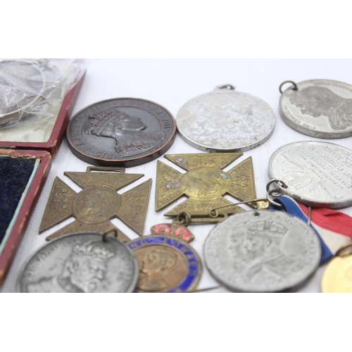 2291 - A collection of Royal medals to include Queen Victoria, Edward VIII, George V etc.